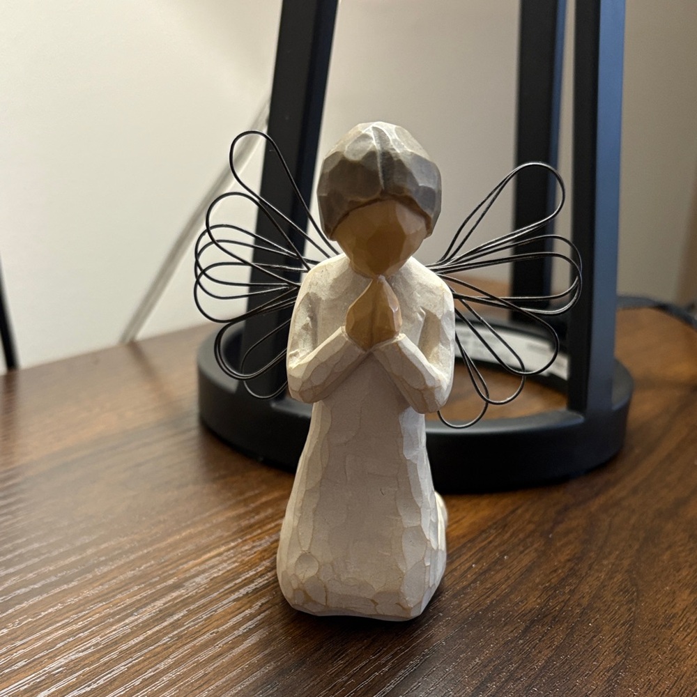 Elegant Cream Angel Figurine with Black Wire Wings